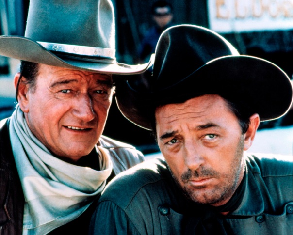 John Wayne and Robert Mitchum on the set of 'El Dorado', 1966